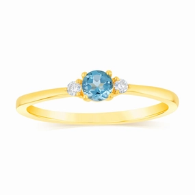 0.30 Carat Blue Topaz and Diamond Ring in 9ct Yellow Gold