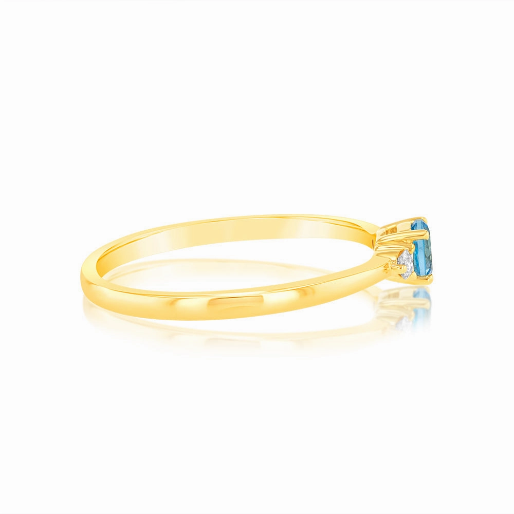 0.30 Carat Blue Topaz and Diamond Ring in 9ct Yellow Gold