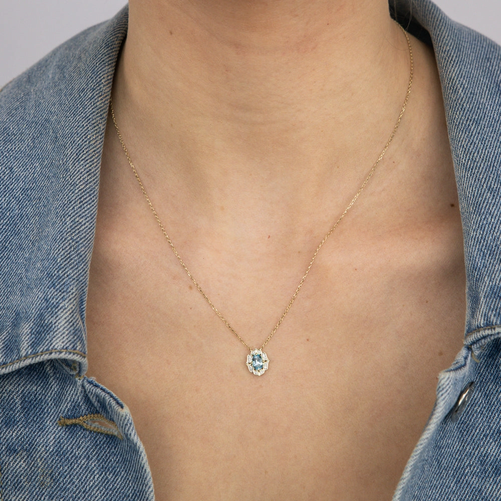 0.55 Carat Blue Topaz Oval and Diamond Pendant with 45m Chain in 9ct Yellow Gold