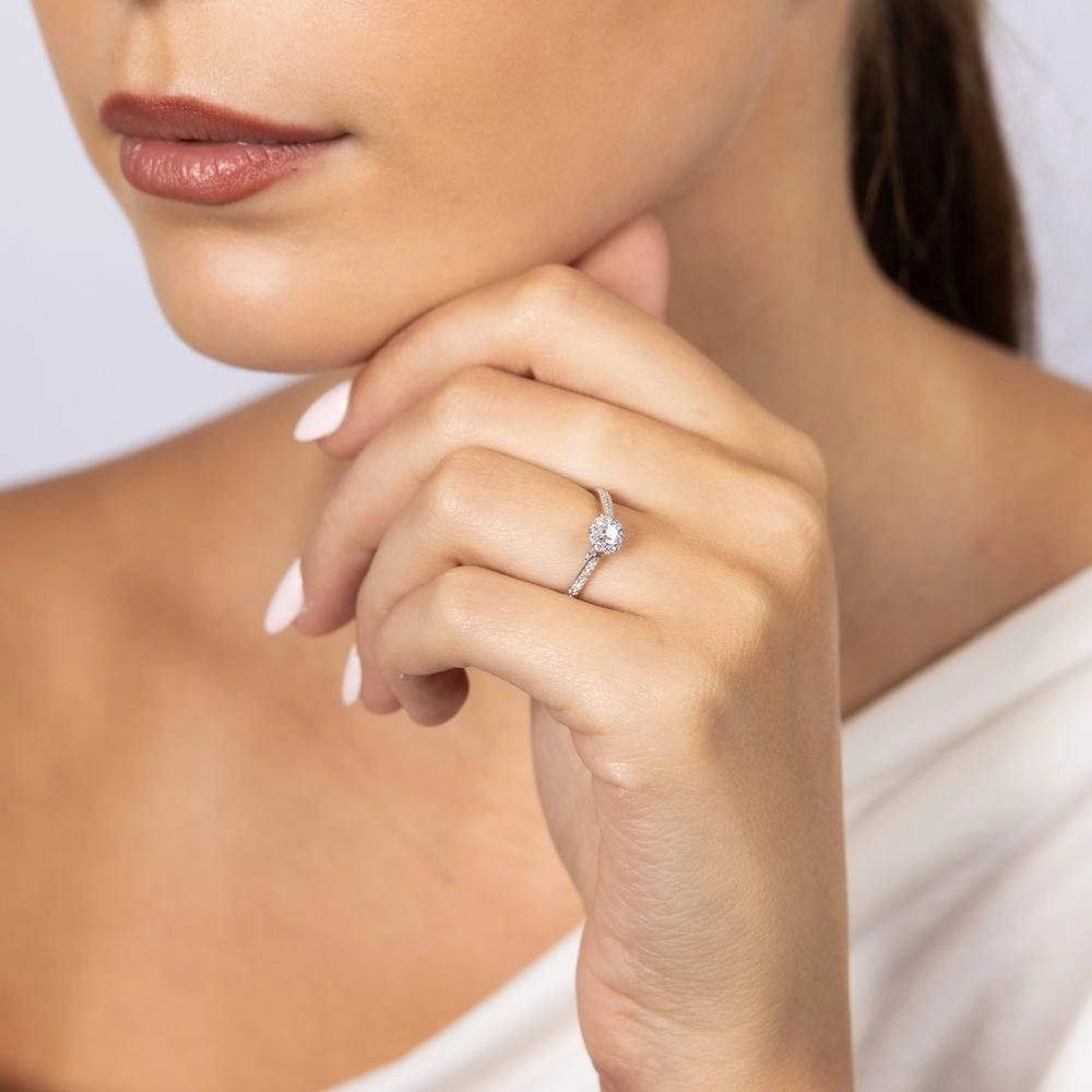 9ct White Gold 1/4 Carat Diamond Halo Solitaire Ring