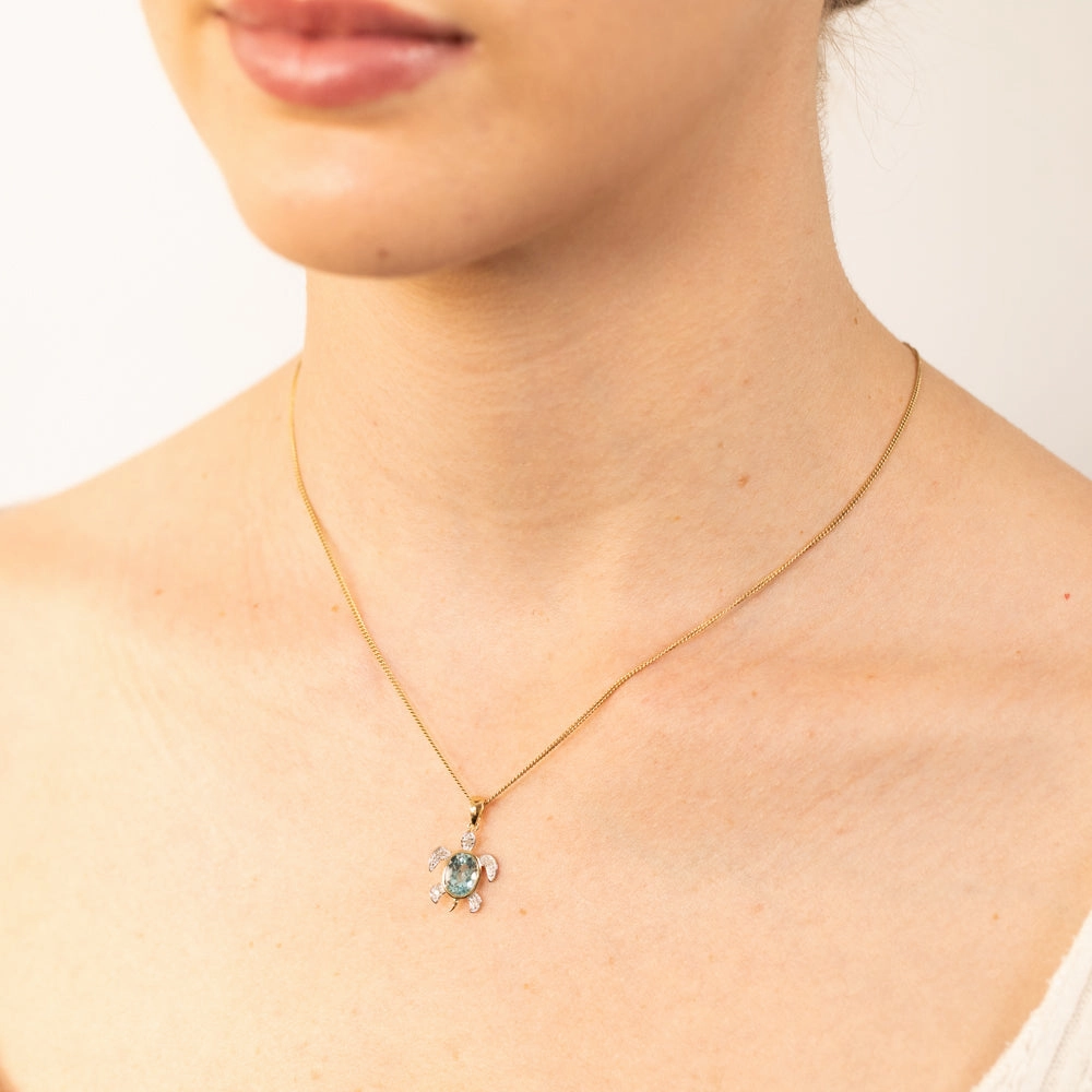 Sky Blue Topaz Tortoise Pendant with 5 Diamonds in 9ct Yellow Gold