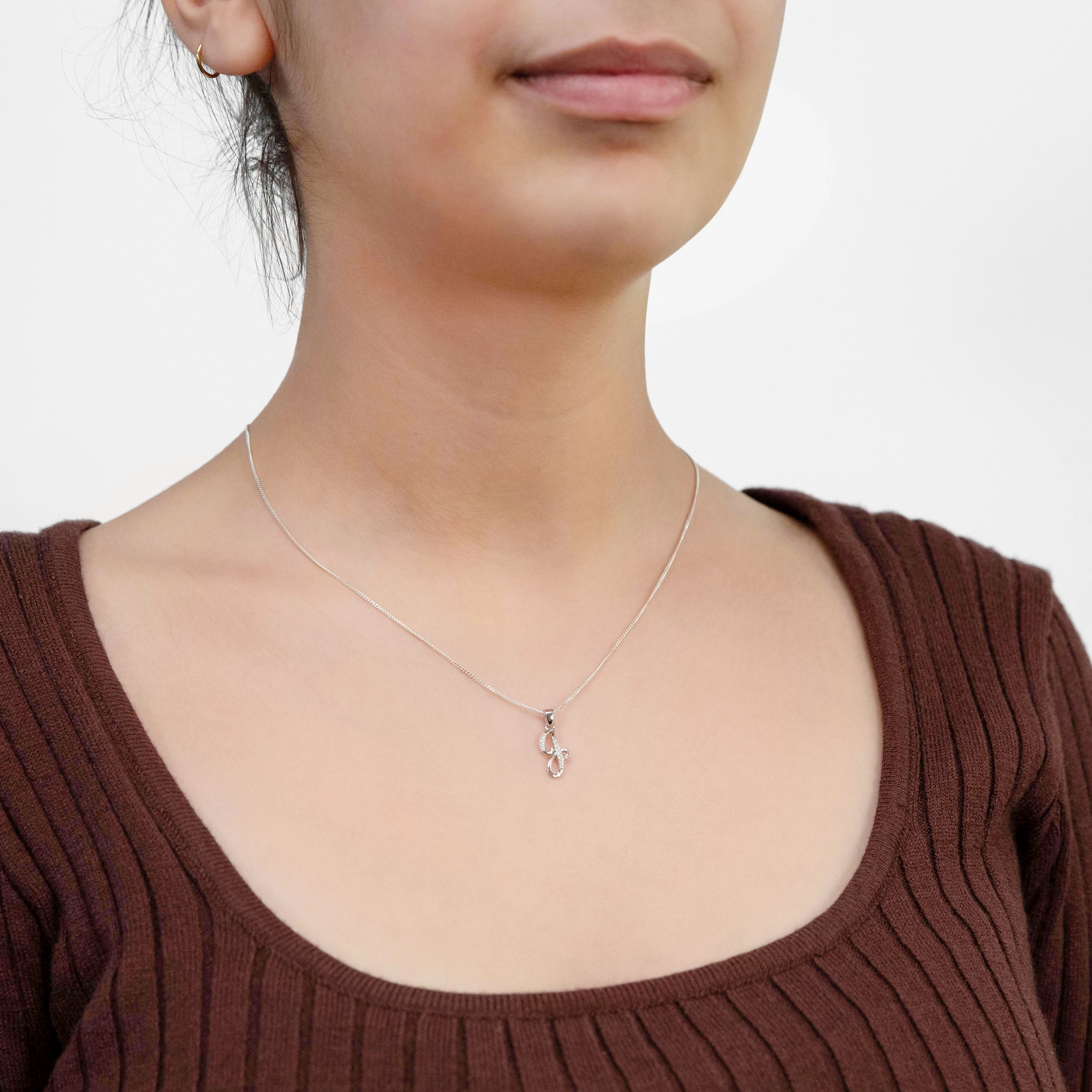 Sterling Silver Rhodium Plated Cubic Zirconia Script "J" Initial Pendant